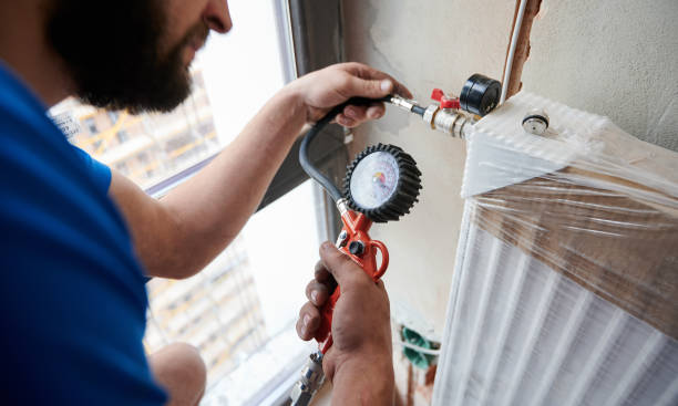 Faut-il purger tous les radiateurs avant de remettre le chauffage en service ?